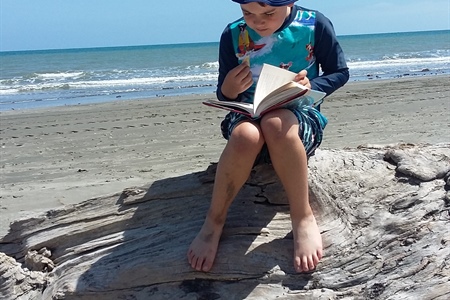 Easy Tips and Tricks to Get Your Child Reading This Summer